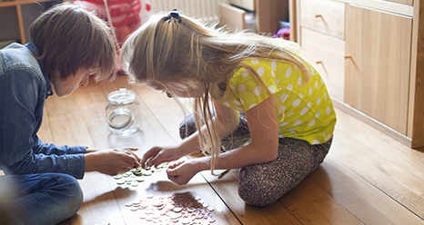 children counting coins